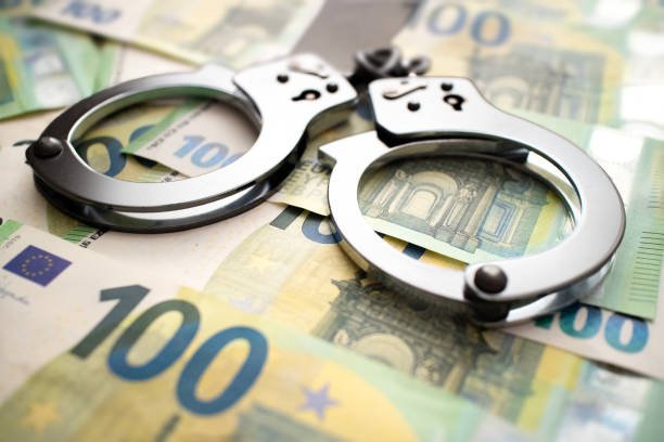 Fraud case arrest handcuffs